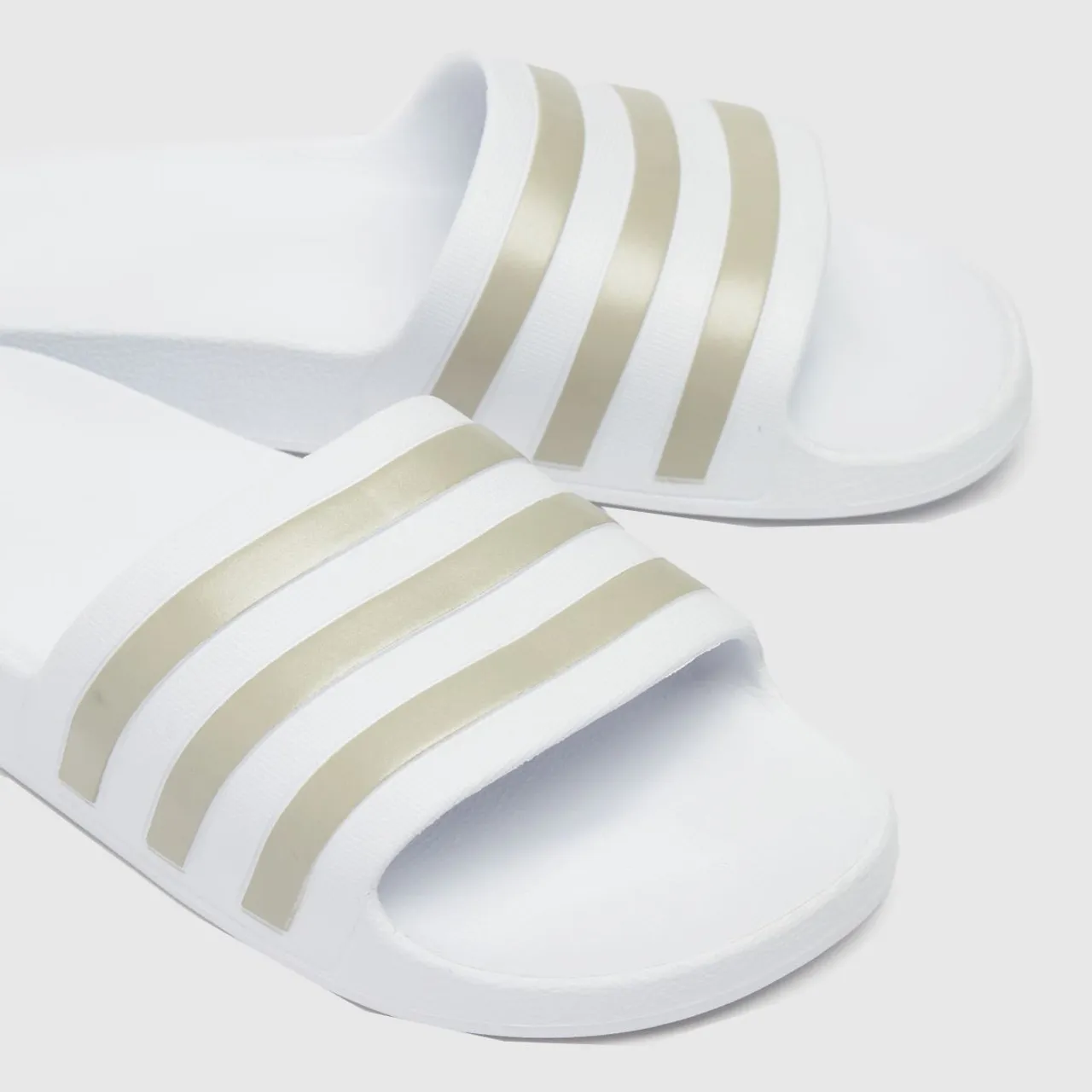 Adidas Adilette Aqua Sandals In White & Gold
