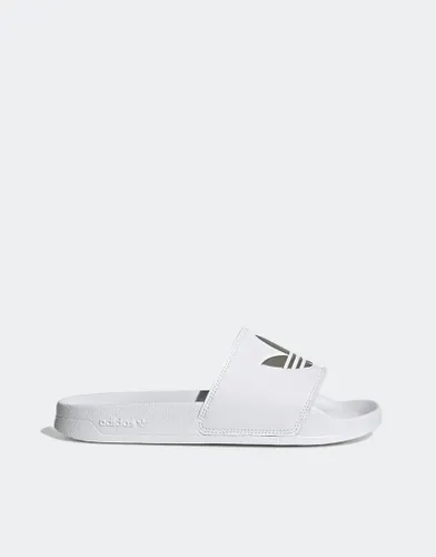 adidas Originals Adilette Lite Trefoil sliders in white and silver