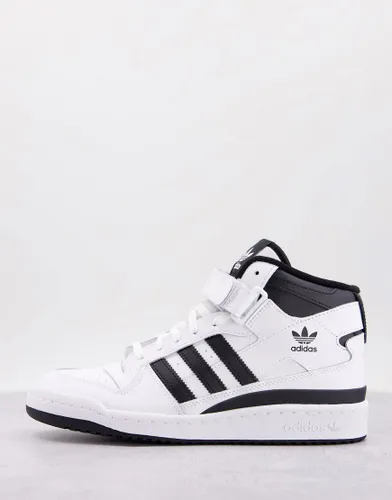 adidas Originals Forum Mid trainers in white and black