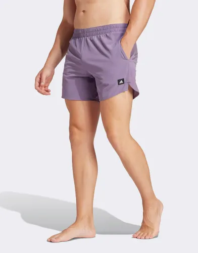 adidas Performance versatile swim shorts in purple