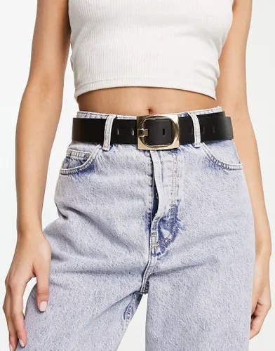 ASOS DESIGN chunky gold buckle waist and hip jeans belt in black