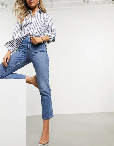 ASOS DESIGN high rise stretch 'slim' straight leg jeans in midwash-Blue