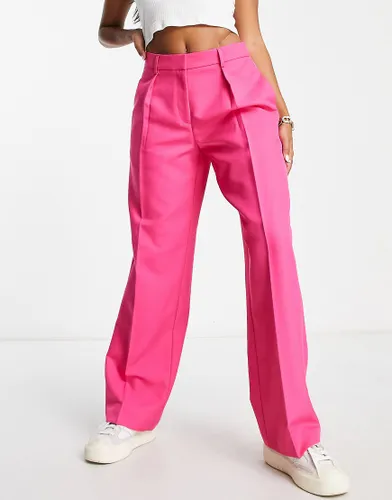ASOS DESIGN Hourglass everyday slouchy boy suit trouser in pink