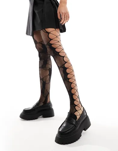 ASOS DESIGN lace tights with side cut out detail in black