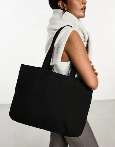 ASOS DESIGN laptop compartment canvas tote bag in black - BLACK