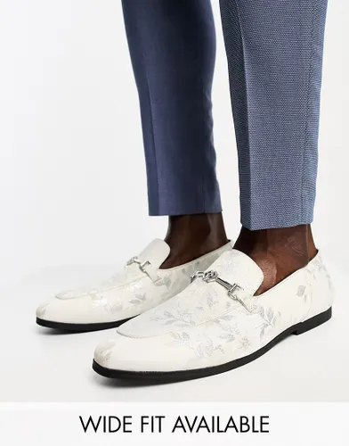 ASOS DESIGN loafers in white floral print with silver snaffle