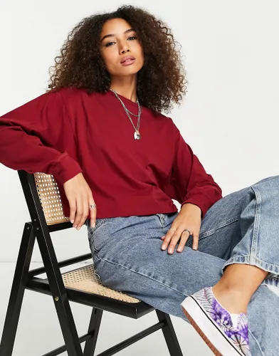 ASOS DESIGN long sleeve boxy t-shirt with seam detail in burgundy-Red