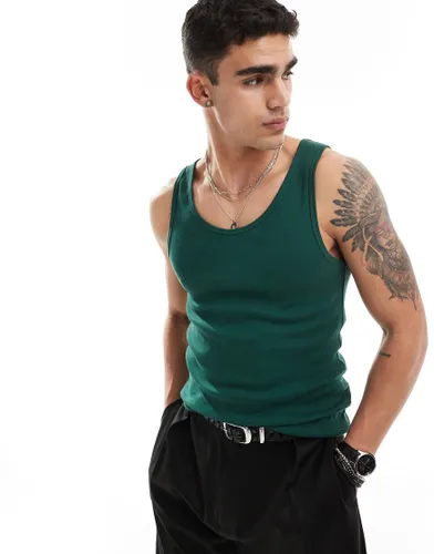 ASOS DESIGN muscle fit rib vest in dark green