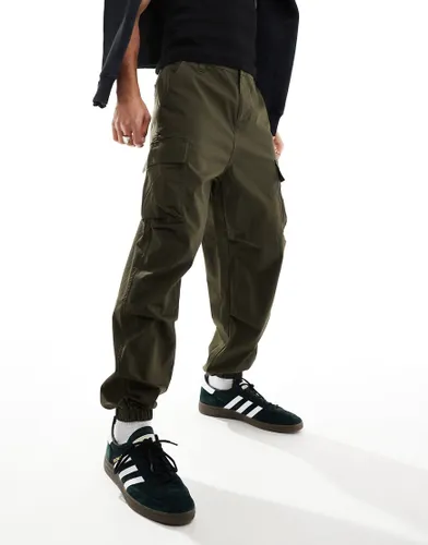 ASOS DESIGN oversized tapered cargo trousers in khaki-Green