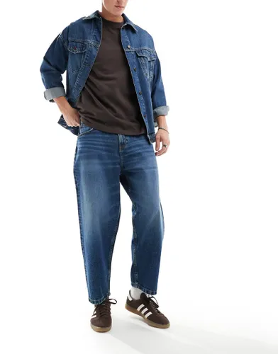 ASOS DESIGN oversized tapered jeans in vintage blue