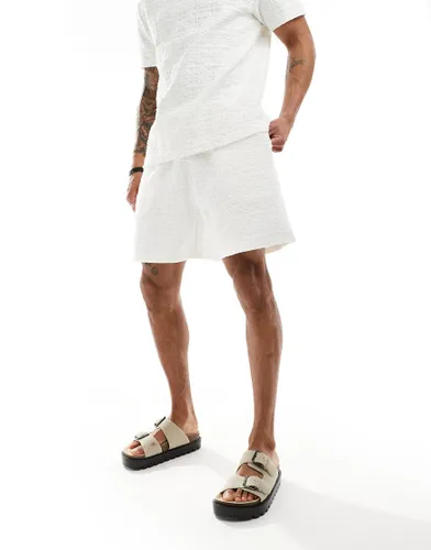 ASOS DESIGN oversized texture shorts in white-Neutral