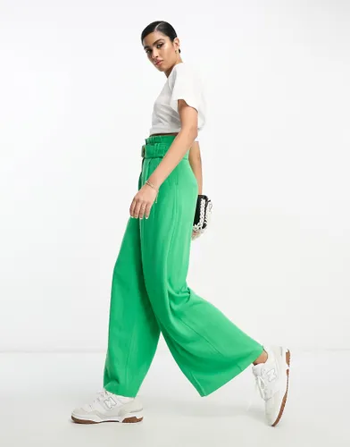 ASOS DESIGN paperbag waist wide leg trouser with linen in green