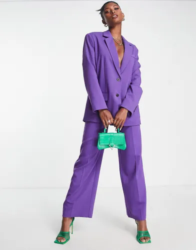 ASOS DESIGN relaxed suit trousers in purple