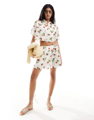 ASOS DESIGN satin wrap mini skirt in strawberry print co-ord-Multi