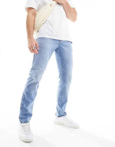 ASOS DESIGN slim jeans in light wash blue