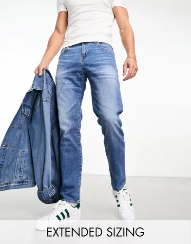 ASOS DESIGN slim jeans in mid wash blue