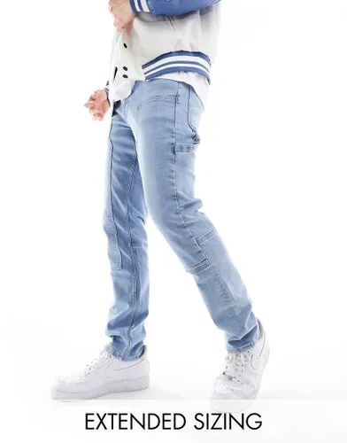 ASOS DESIGN slim jeans with carpenter detail in light wash blue