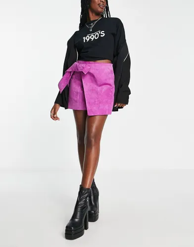 ASOS DESIGN suede wrap mini skirt with tie detail in magenta-No colour
