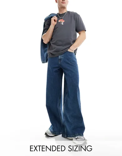 ASOS DESIGN super wide leg jeans in mid wash blue
