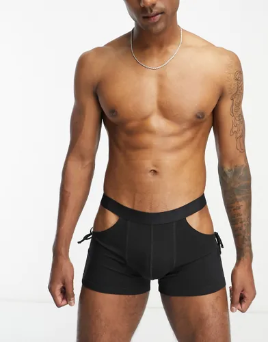 ASOS DESIGN trunks in black with cut outs and tie side