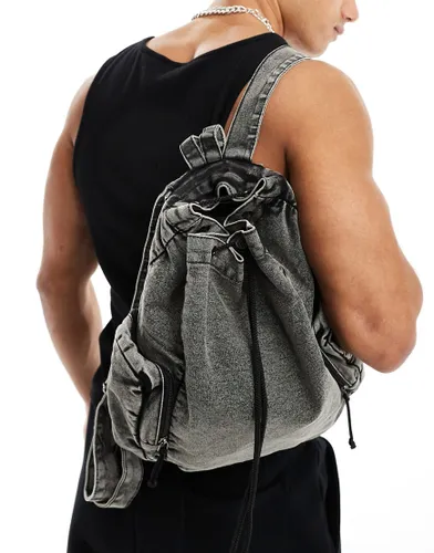 ASOS DESIGN washed canvas backpack in black