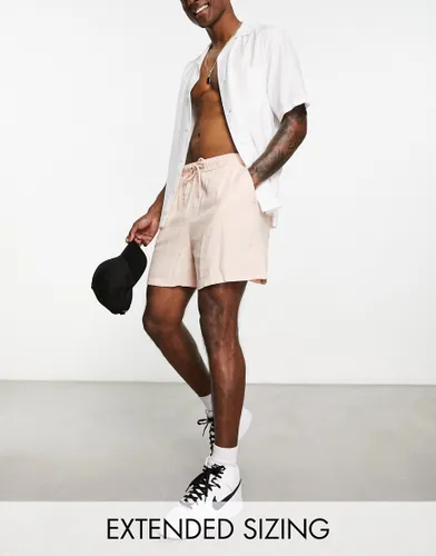 ASOS DESIGN wide linen shorts in shorter length in pink