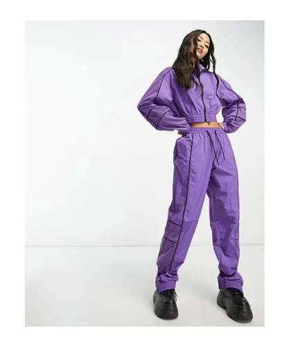 ASOS DESIGN Womens piped detail track pant in purple co-ord