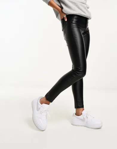 Bershka coated faux leather high waisted skinny trousers in black