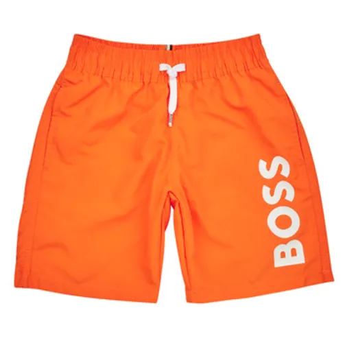 BOSS  J24846-401-C  boys's Children's shorts in Orange