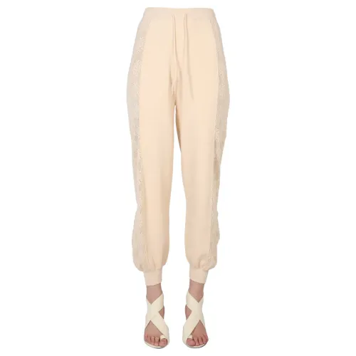 Boutique Moschino , Jogging Pants ,Beige female, Sizes: