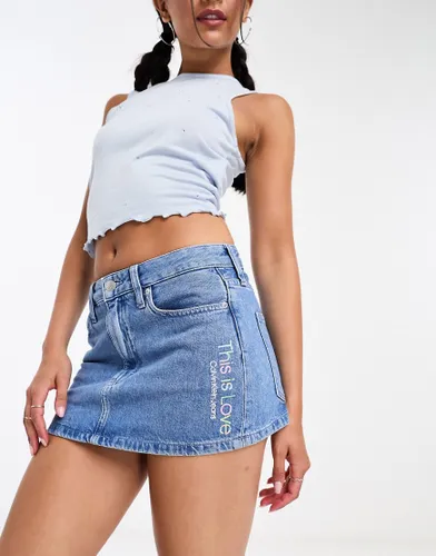 Calvin Klein Jeans Pride denim micro mini skirt in light wash blue