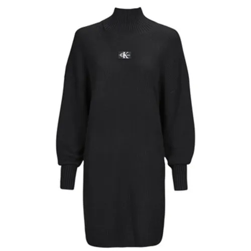 Calvin Klein Jeans  WOVEN LABEL LOOSE SWEATER DRESS  women's Dress in Black