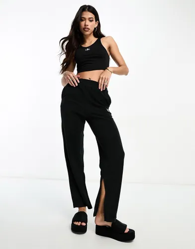 Calvin Klein monogram beachwear high waist trouser in black