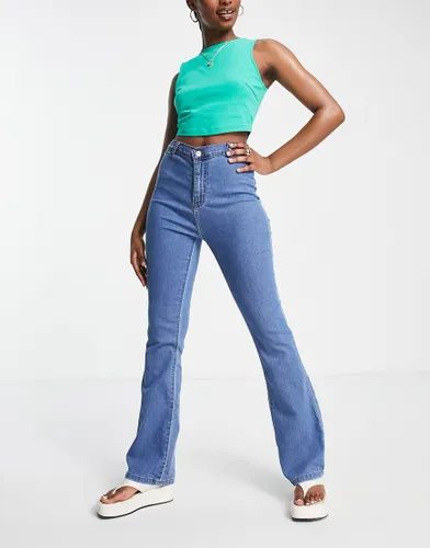 DTT Bianca high waisted wide leg disco jeans in mid blue
