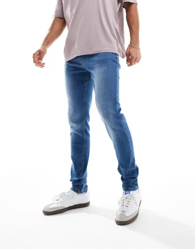 DTT stretch super skinny jeans in mid blue