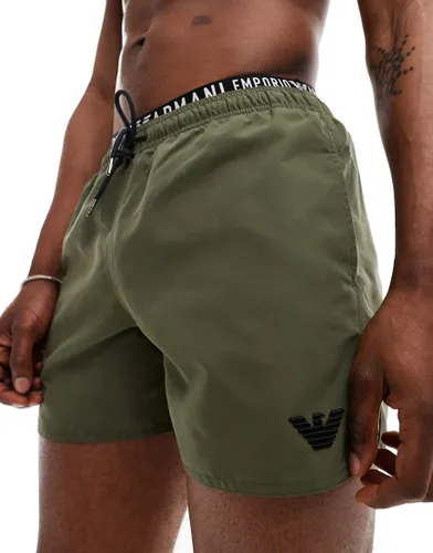 Emporio Armani Bodywear logo waistband swim shorts in khaki-Green
