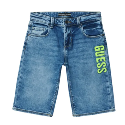 Guess  CONFRERET  boys's Children's shorts in Blue