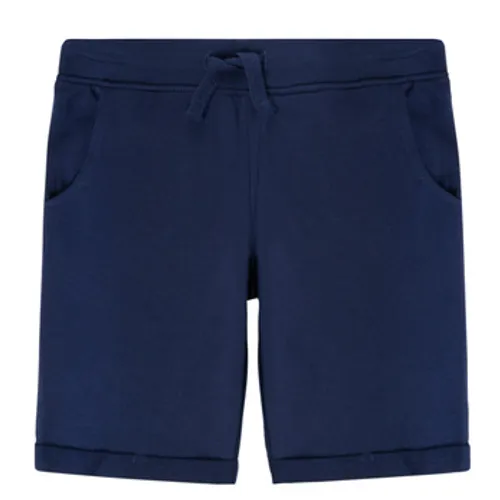 Guess  INESO  boys's Children's shorts in Blue