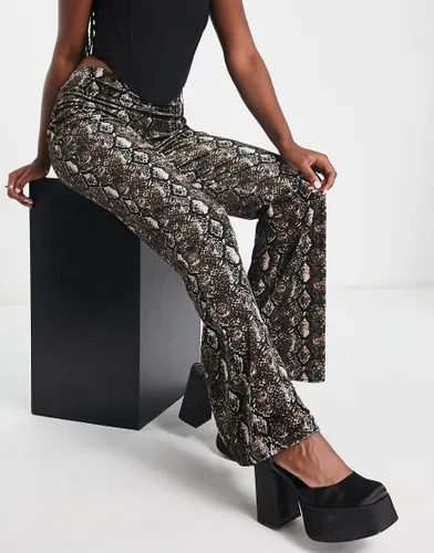 I Saw It First flared trousers in burnout snake print-Multi