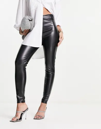 I Saw It First leather look ruched bum legging in black-White