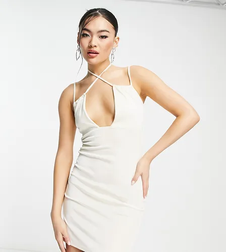 In The Style x Yasmin Devonport exclusive mini cut out detail mini bodycon dress in cream-White