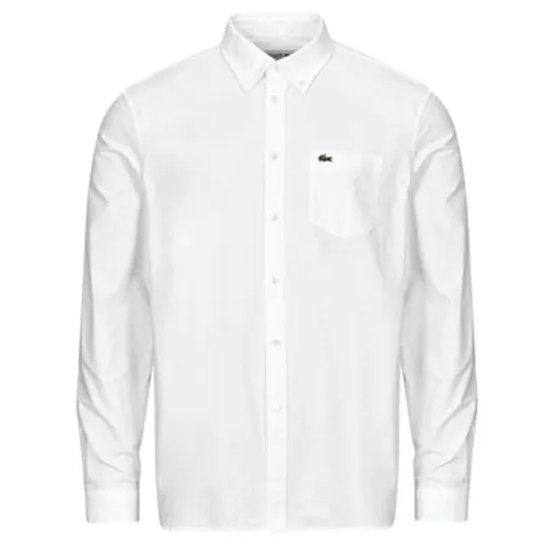 Lacoste  CH1911  men's Long sleeved Shirt in White