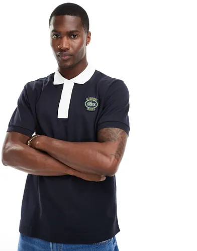 Lacoste contrast polo top with logo in navy-Blue