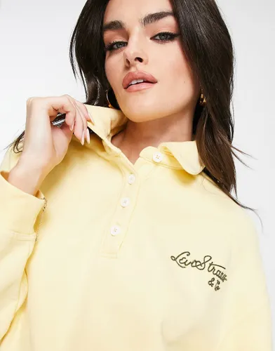 Levi's vintage sport script logo cropped poloshirt in yellow