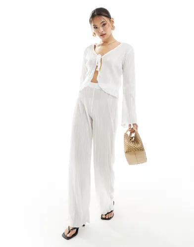Missyempire exclusive plisse wide leg beach trousers co-ord in white
