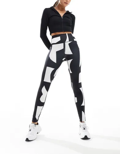 Monki seamless yoga high waist active gym leggings in multi black and white abstract print