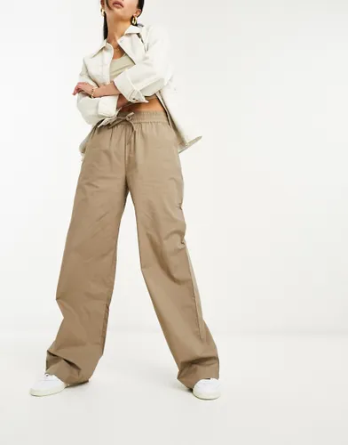 NA-KD elastic waistband baggy trousers in khaki-Green