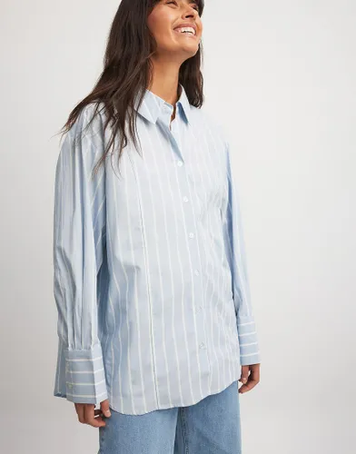 NA-KD x Laura Jane Stone oversized shirt with high cuffs in blue & white stripe