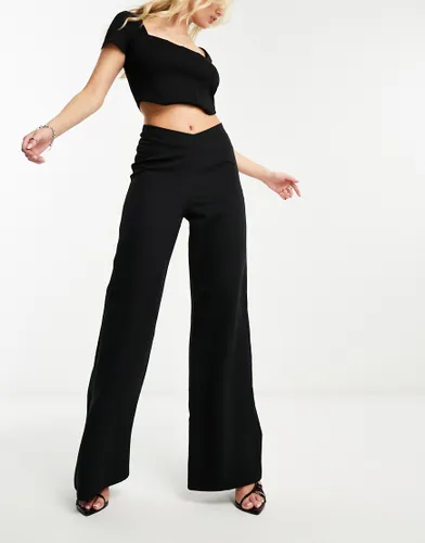 NaaNaa wide leg trousers with v-waist detail in black