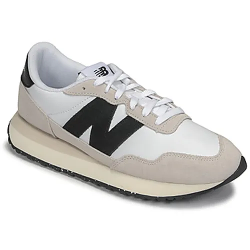 New Balance  237  men's Shoes (Trainers) in Beige